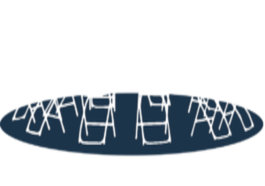 White folding chairs arranged in a circle on a dark blue circular floor.